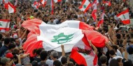 عشرات الآلاف يتظاهرون في لبنان وسط دعوات لتنفيذ إضراب عام غدًا