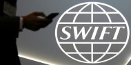 روسيا تتأهب لاحتمال فصلها عن نظام "SWIFT" الدولي المالي