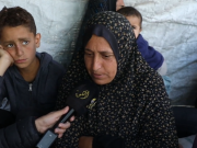 كاميرا "الكوفية" ترصد معاناة أسرة نازحة من 14 فردا تعيش في خيمة واحدة برفح